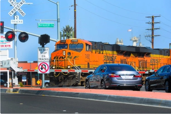 Railroad crossing barrier